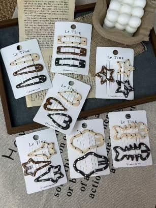 Cream and Gold Outline Snap Hair Clips, Star and Wave