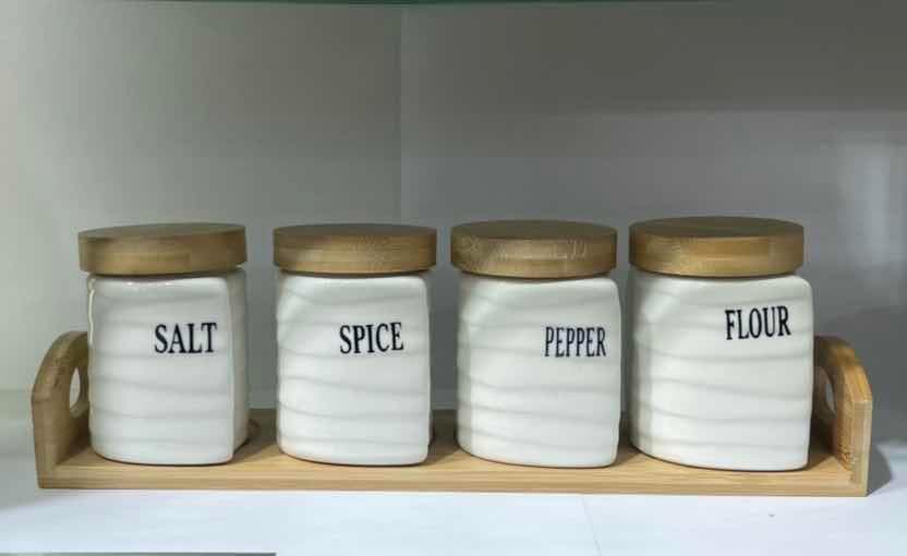 4-Piece Wave-Relief Ceramic Spice Jar Set with Bamboo Lids on Bamboo Tray