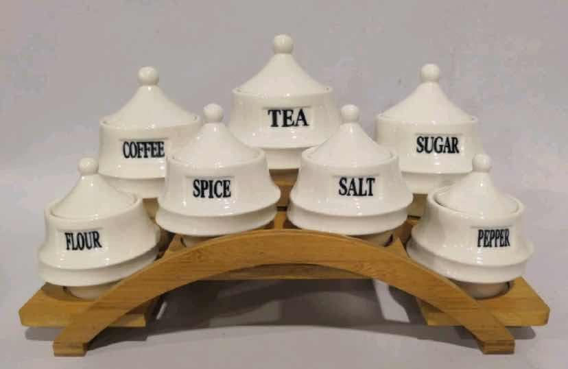 7-Piece Labelled Ceramic Canister and Spice Set on Arched Bamboo Stand