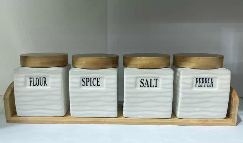 4-Piece Square Ribbed Ceramic Spice Jar Set with Wooden Lids on Bamboo Tray