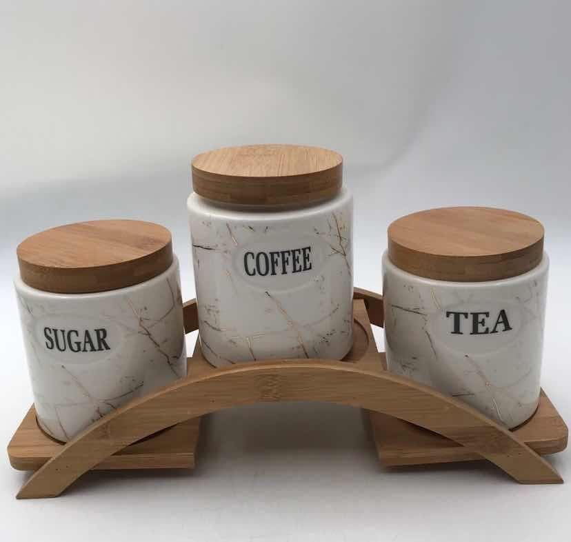 3-Piece Marble-Effect Ceramic Canister Set with Bamboo Lids on Arched Bamboo Stand