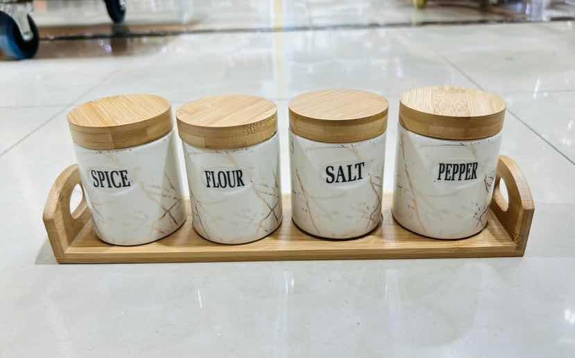 4-Piece Round Marble-Effect Ceramic Spice Jar Set with Bamboo Lids on Bamboo Tray