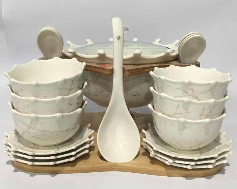 6-Piece Marble-Effect Ceramic Bowl Set with Saucers and Spoons on Bamboo Stand