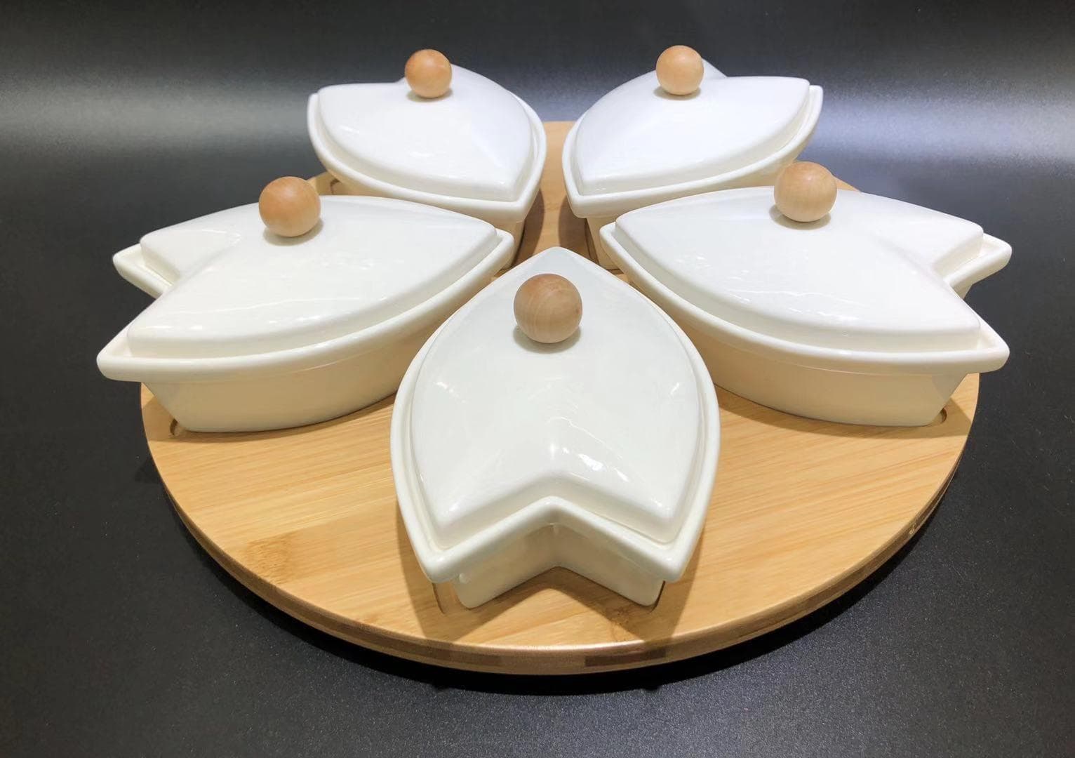 6-Piece Leaf-Shaped Ceramic Serving Set with Bamboo Lids on Rotating Base
