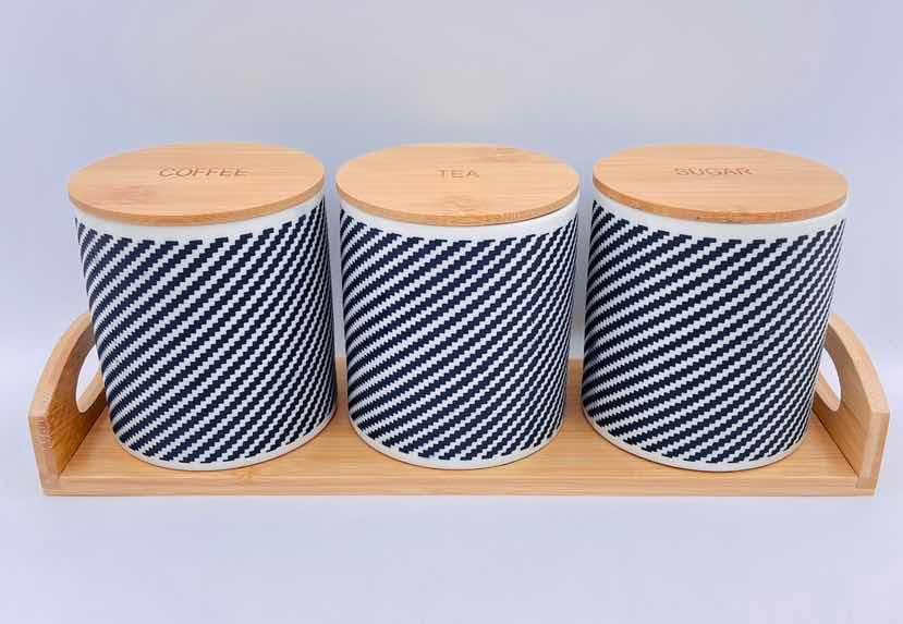 3-Piece Blue Diagonal Stripe Ceramic Canister Set with Bamboo Lids on Bamboo Tray