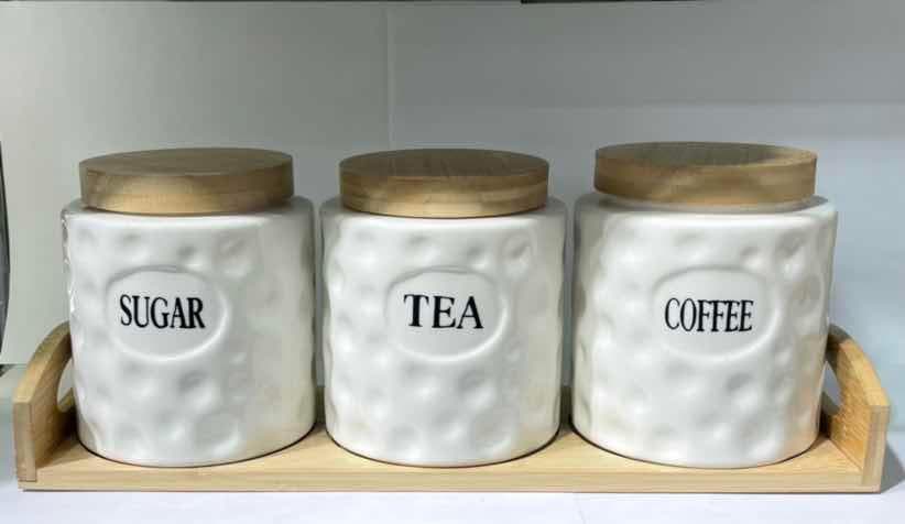 3-Piece Hammered Ceramic Canister Set with Wooden Lids on Bamboo Tray