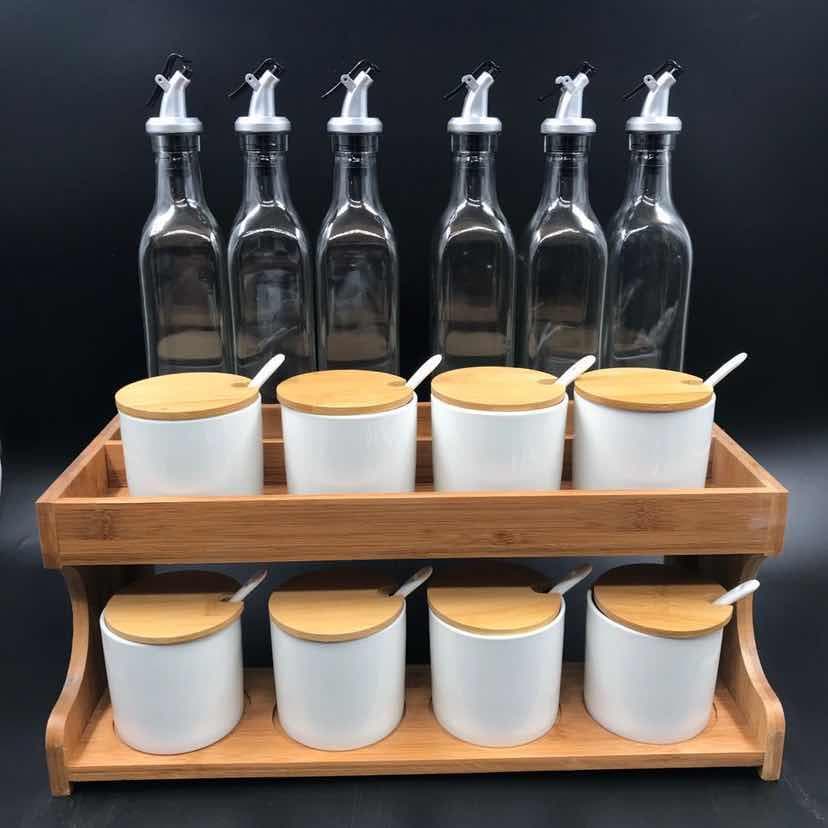 8-Bottle Glass Oil Set with White Ceramic Condiment Jars on Wooden Rack
