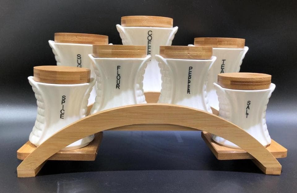 8-Piece Ceramic Spice Jar Set on Arched Bamboo Stand