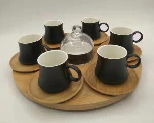 Matte Black Ceramic Coffee Cup Set with Saucers on Round Bamboo Tray