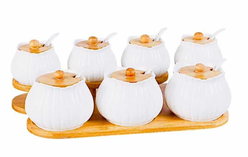7-Piece Ribbed Ceramic Spice Pot Set with Bamboo Lids and Spoons on Tray