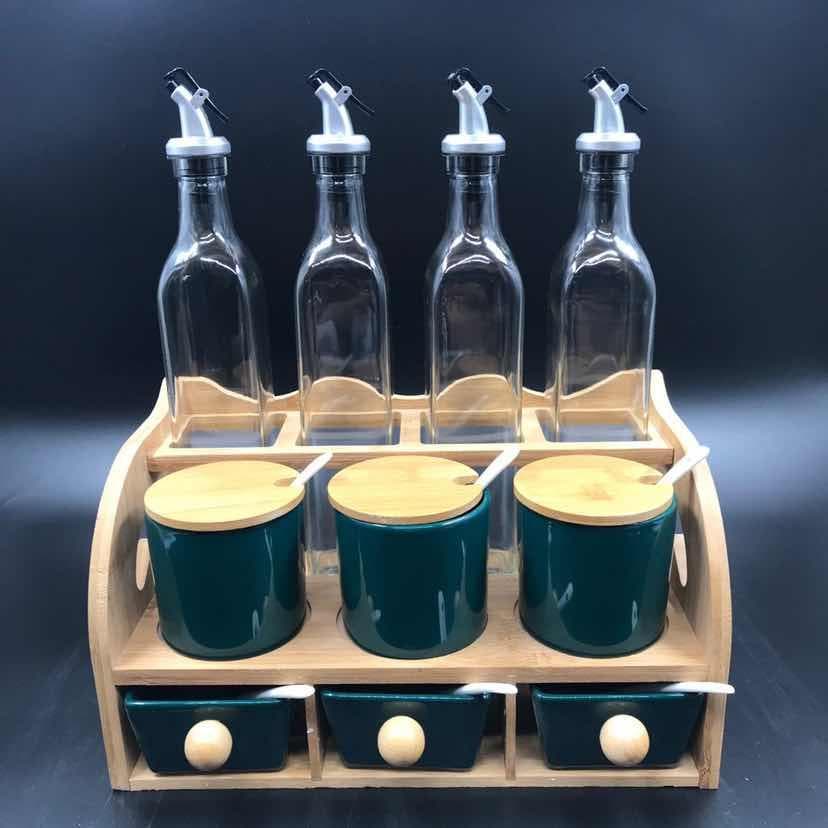Glass Oil Bottle and Green Ceramic Canister Set on Two-Tier Wooden Rack