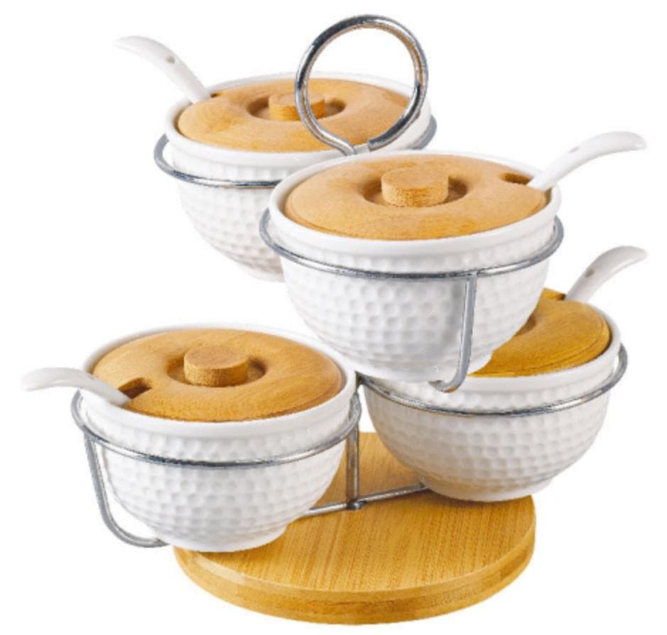4-Piece White Ceramic Condiment Bowl Set with Bamboo Lids and Spoons on Rotating Base
