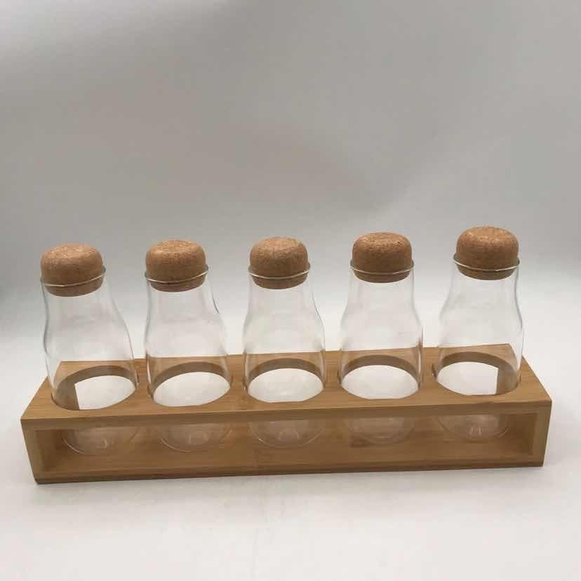 5-Piece Glass Bottle Set with Cork Stoppers on Bamboo Rack