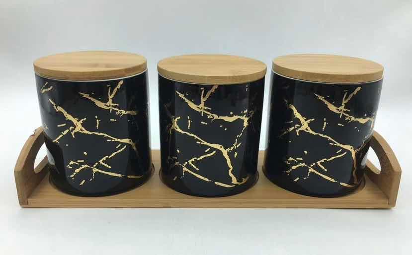 3-Piece Black and Gold Marble-Effect Ceramic Canister Set with Bamboo Lids on Bamboo Tray