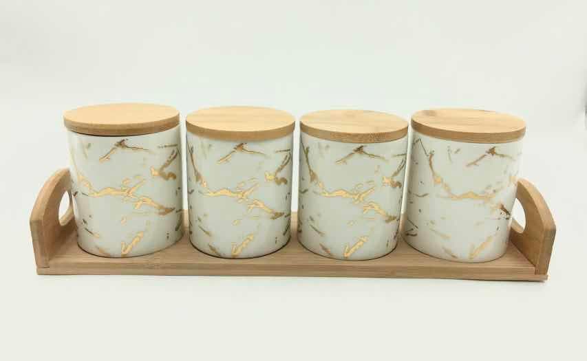 4-Piece White Marble-Effect Ceramic Canister Set with Bamboo Lids on Bamboo Tray