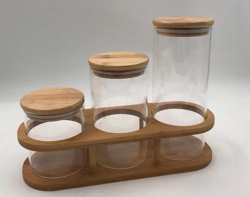 2-Piece Glass Storage Jar Set with Bamboo Lids on Bamboo Stand
