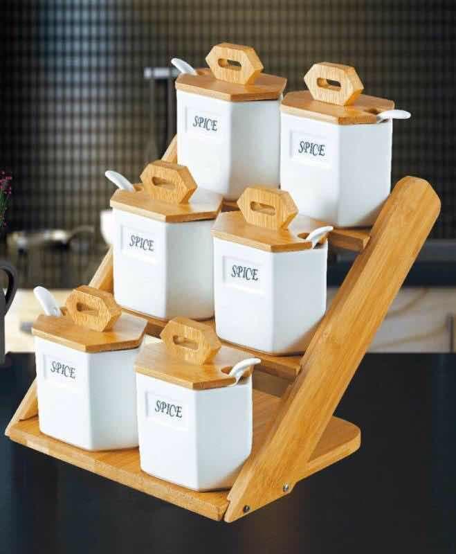 6-Piece Square Ceramic Spice Jar Set with Spoons on Angled Bamboo Rack