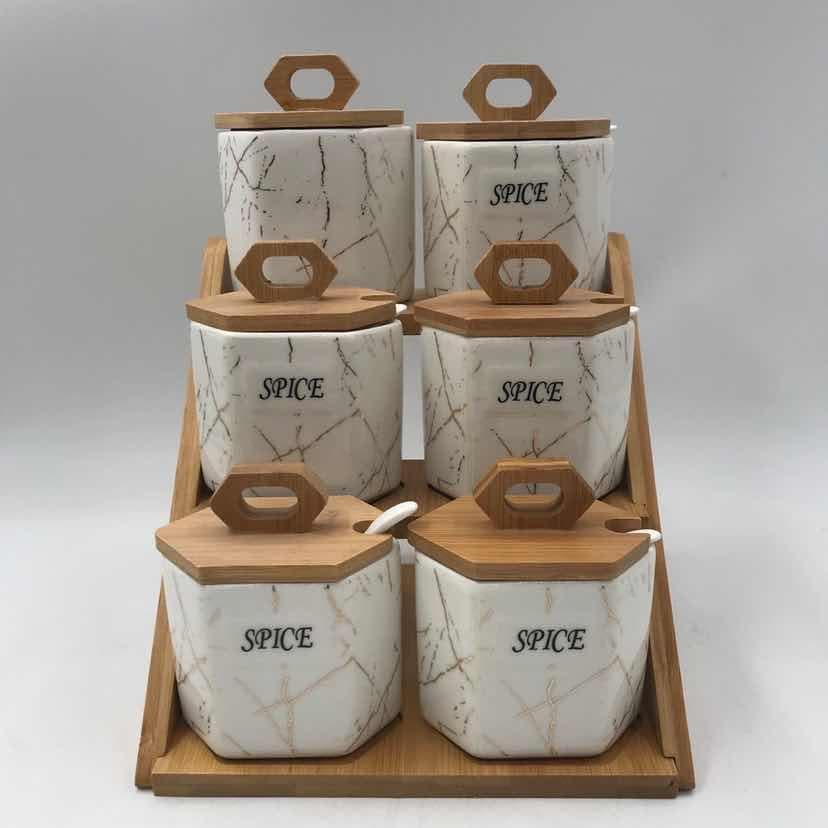 6-Piece Marble-Effect Ceramic Spice Jar Set with Bamboo Lids on Two-Tier Rack