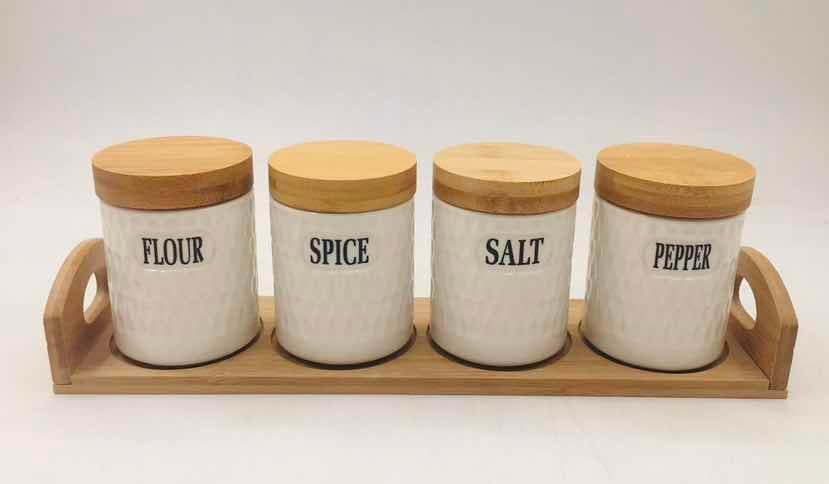 4-Piece Plain Round Ceramic Spice Jar Set with Bamboo Lids on Bamboo Tray