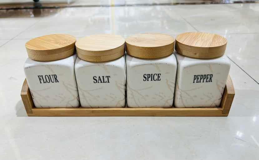 4-Piece Square Marble-Effect Ceramic Spice Jar Set with Bamboo Lids on Bamboo Tray