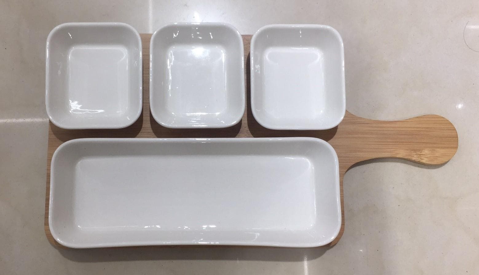 4-Section Ceramic Serving Dish Set on Bamboo Paddle Board