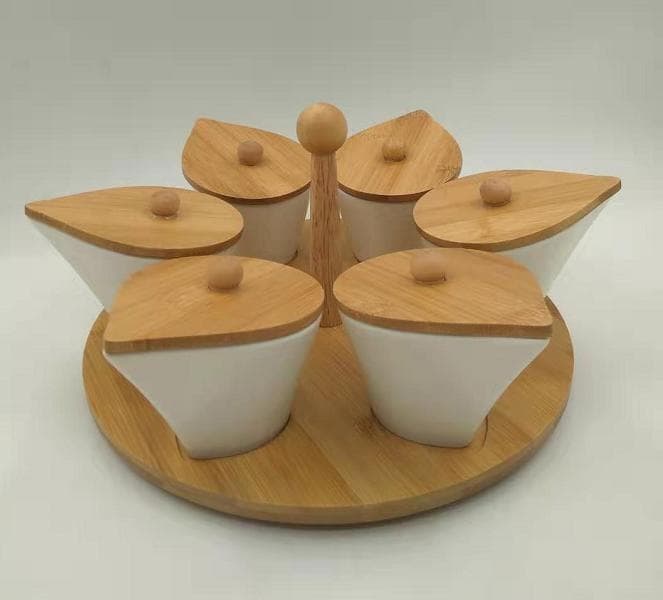 4-Piece Petal Ceramic Serving Set with Bamboo Lids on Rotating Base