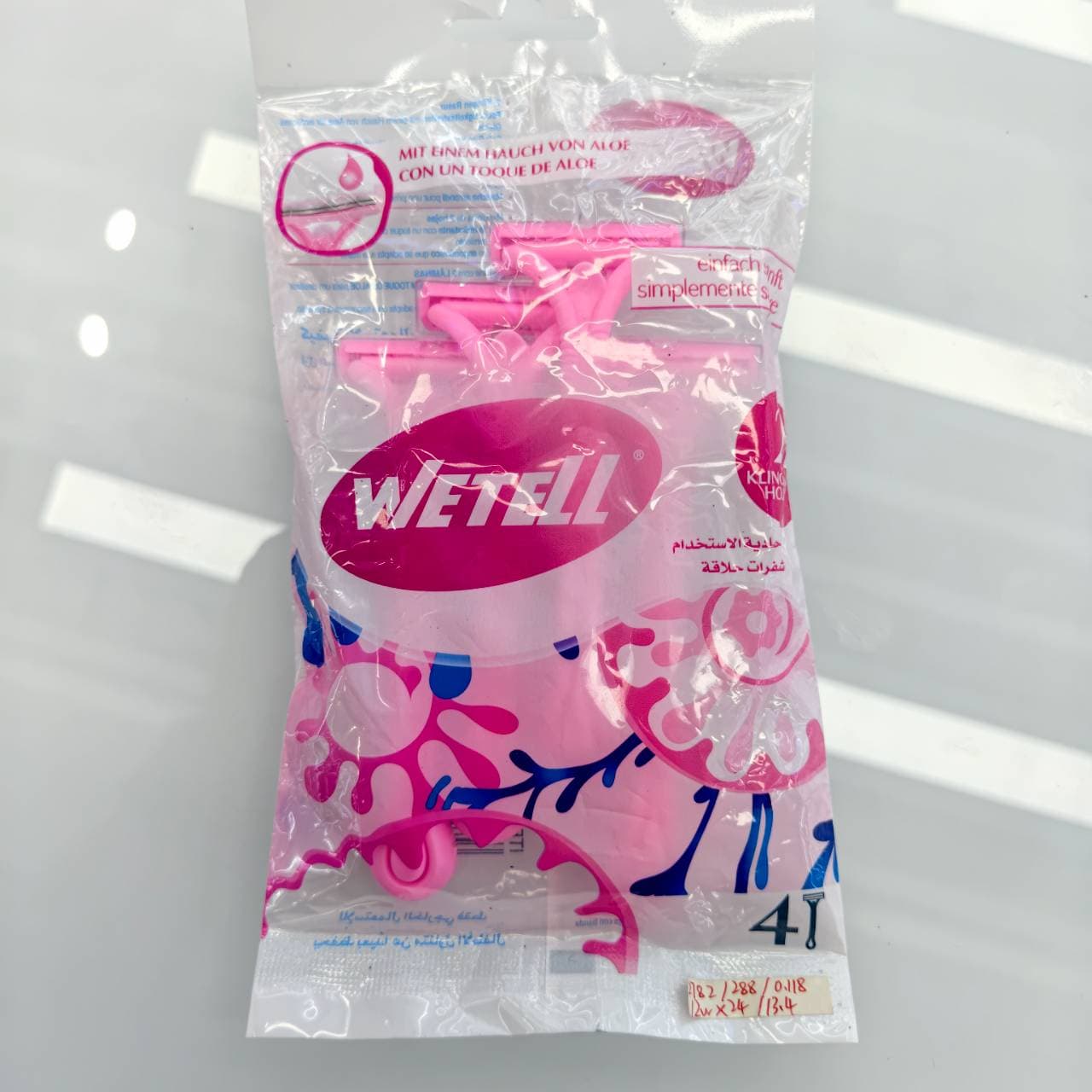 WeTell Women's Disposable Twin Blade Razors, Aloe Strip, 4-Pack