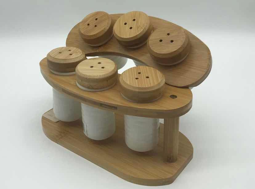 6-Piece Ceramic Spice Shaker Set on Curved Bamboo Stand
