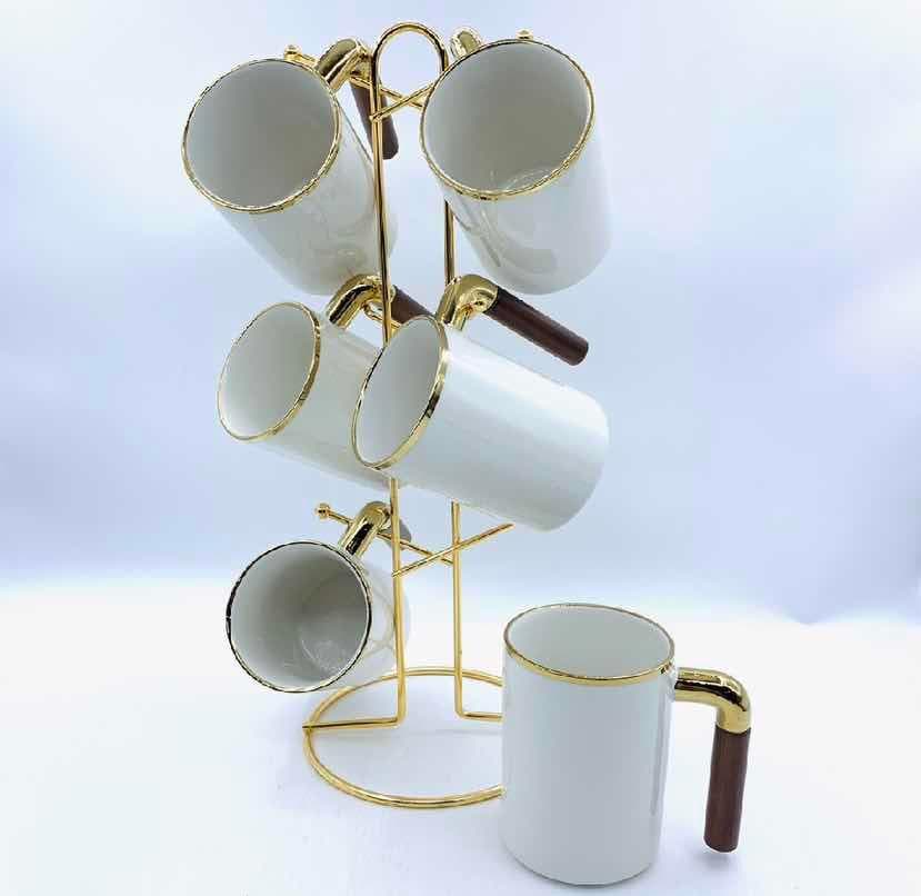 6-Piece Gold-Rimmed Ceramic Mug Set with Wooden Handles on Gold Metal Mug Tree, White